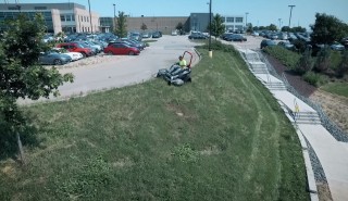 Tracked zero turn cutting slopes